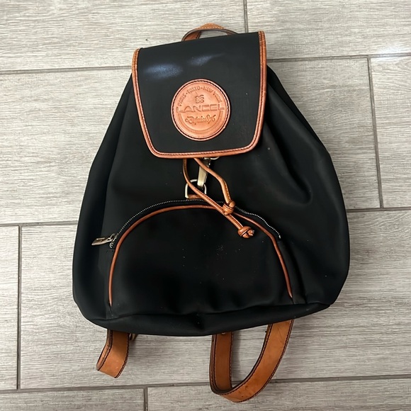 Lancel Handbags - Lancel Vintage Canvas and Leather Backpack